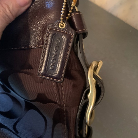 Coach Brown signature handbag, zips, GOLD hardware, Purple lining and footed. - Picture 7 of 11